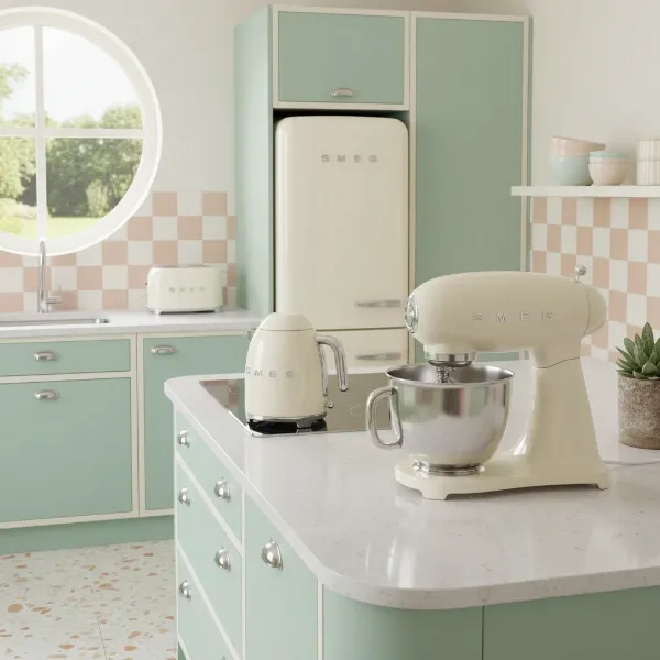 Smeg Retro Stand Mixer as a centerpiece in a stylish 1950s inspired kitchen with other matching Smeg appliances.